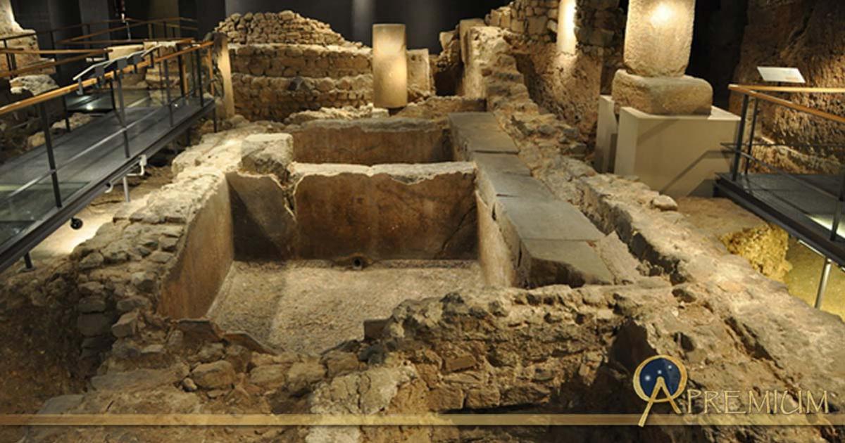 Remains of an ancient Roman salt fish factory and garum factory in the archaeological underground ruins at Plaça del Rei.
