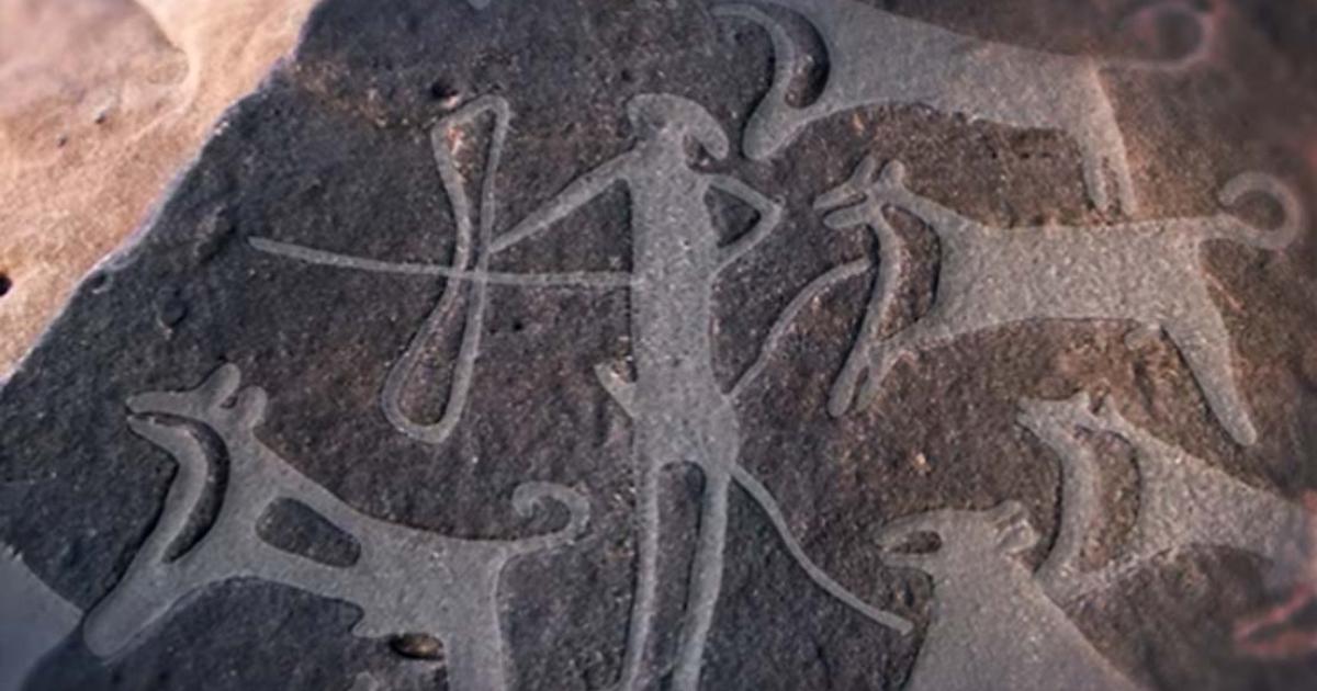 Image showing part of the engraving found in the Arabian Desert with dogs on leashes 