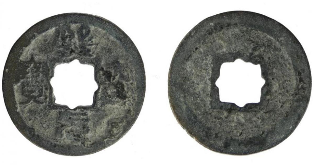 The worn cast copper alloy Chinese coin, from the Northern Song dynasty (960 AD to 1127 AD), minted during the Xining reign between 1068 and 1077 AD, and found in Britain