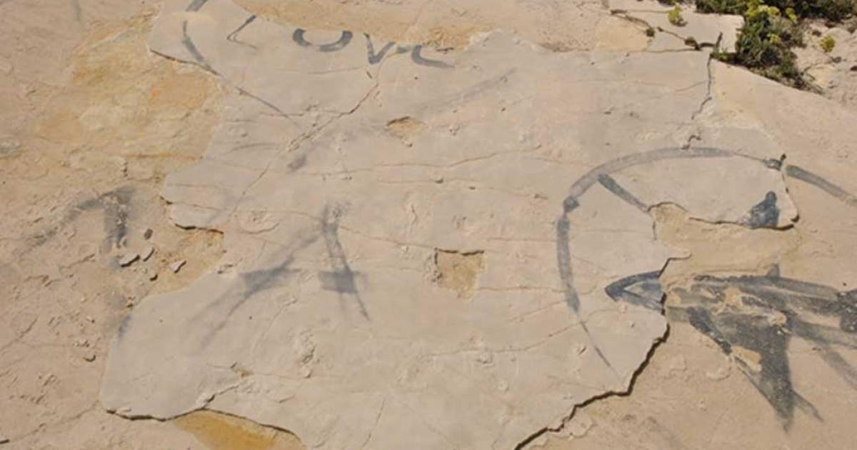 Vandalised site, showing fresh sand along the edges of the slab where it has been lifted and the holes left by the removal of two blocks in the centre. Babis Fassoulas, Author provided