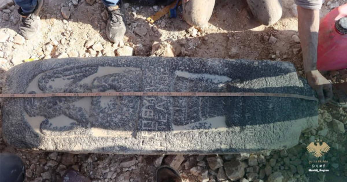 Black basalt Roman stele with a carved eagle discovered in Manbij, Syria
