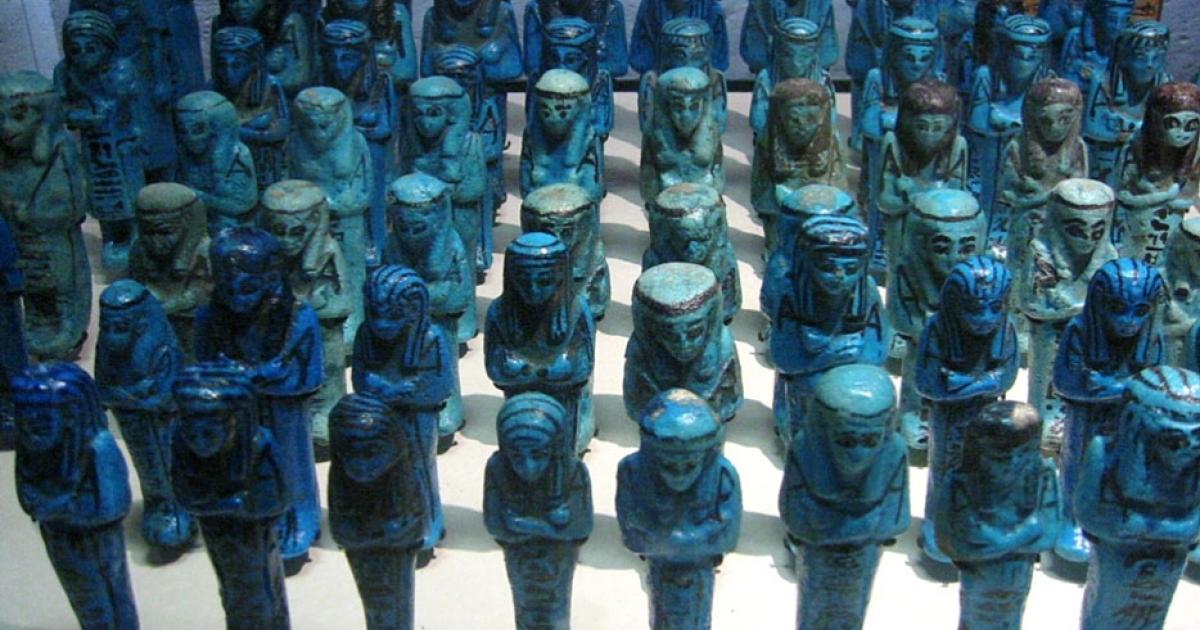Egyptian blue shabti figures on display in the Egyptian exhibit at the Louvre in France in 2006. 