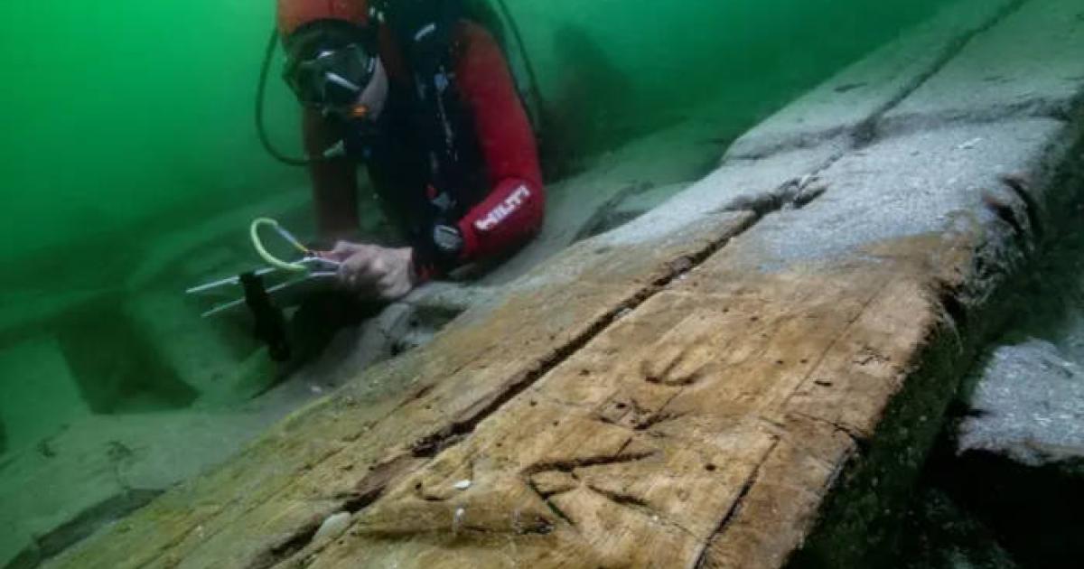 The boat’s well-preserved timbers  including grafitti.