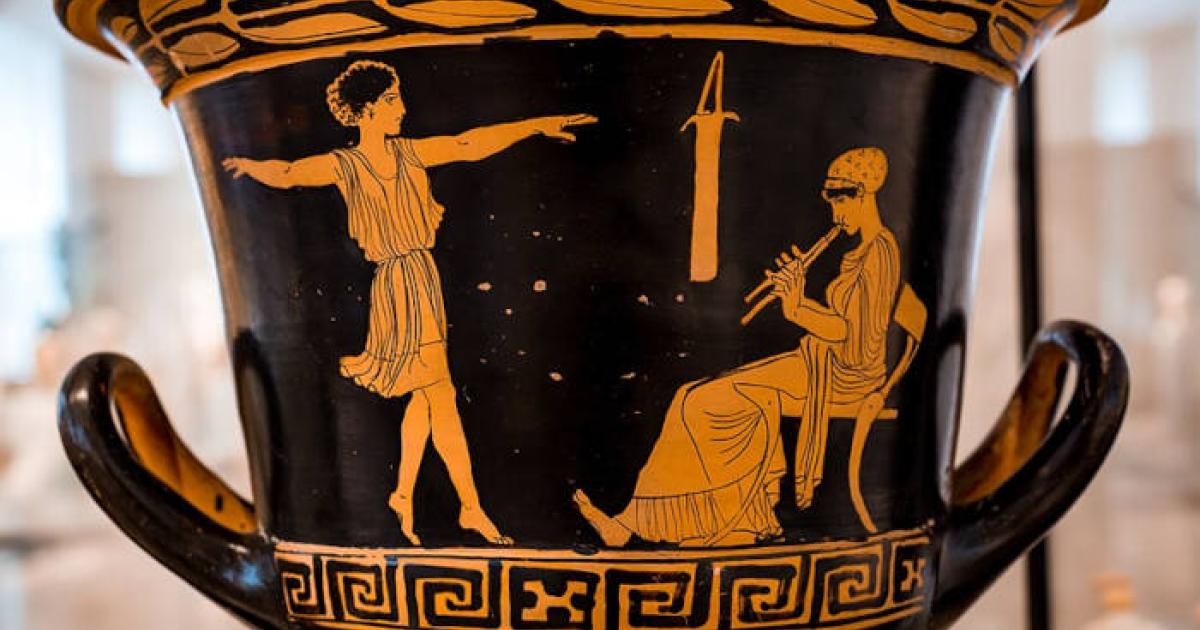 A dancing girl and woman (music teacher) seated on chair playing auloi on red and black ceramic.