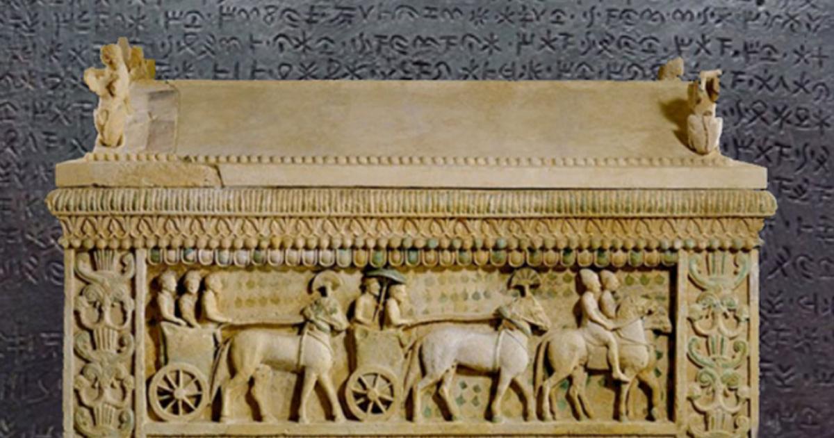 The 5th century BC Amathus sarcophagus found in Amathus integrates Greek, Cypriot, and Oriental features. (Public Domain) Background: Detail of the Idalion Decree, a Bronze plaque engraved on both faces with a Cyprian inscription.