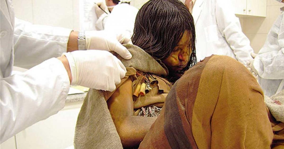 Llullaillaco mummy being examined by scientists (CC by 2.0)