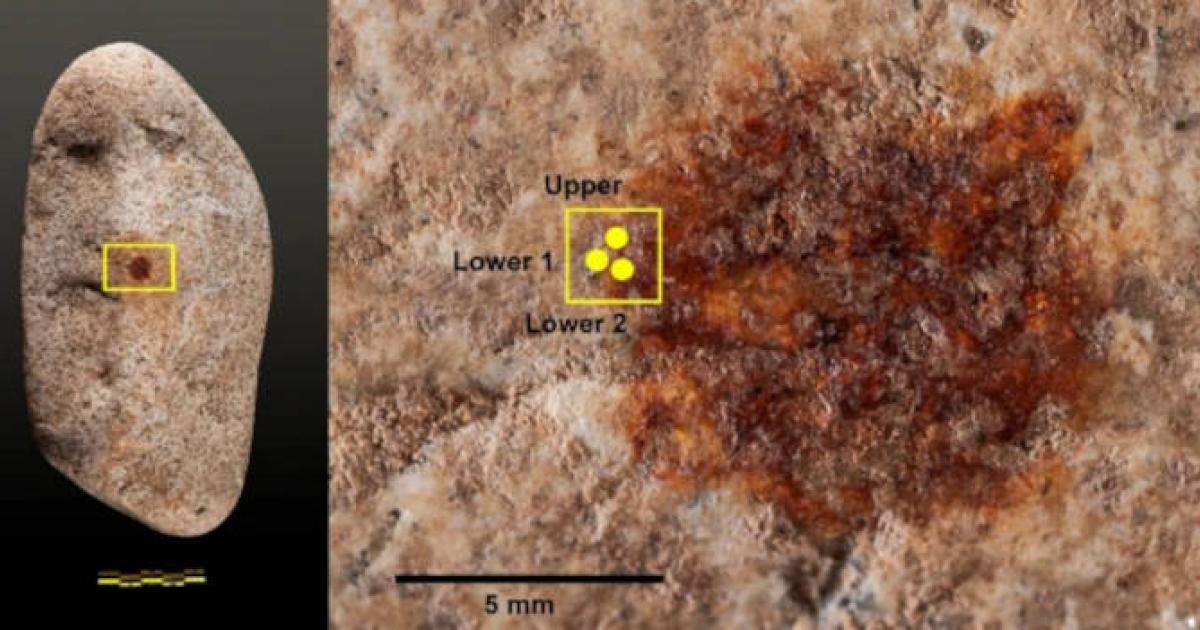 Left; the red dot on a stone, found to be a fingerprint. Right; Sample zones in the red dot.  