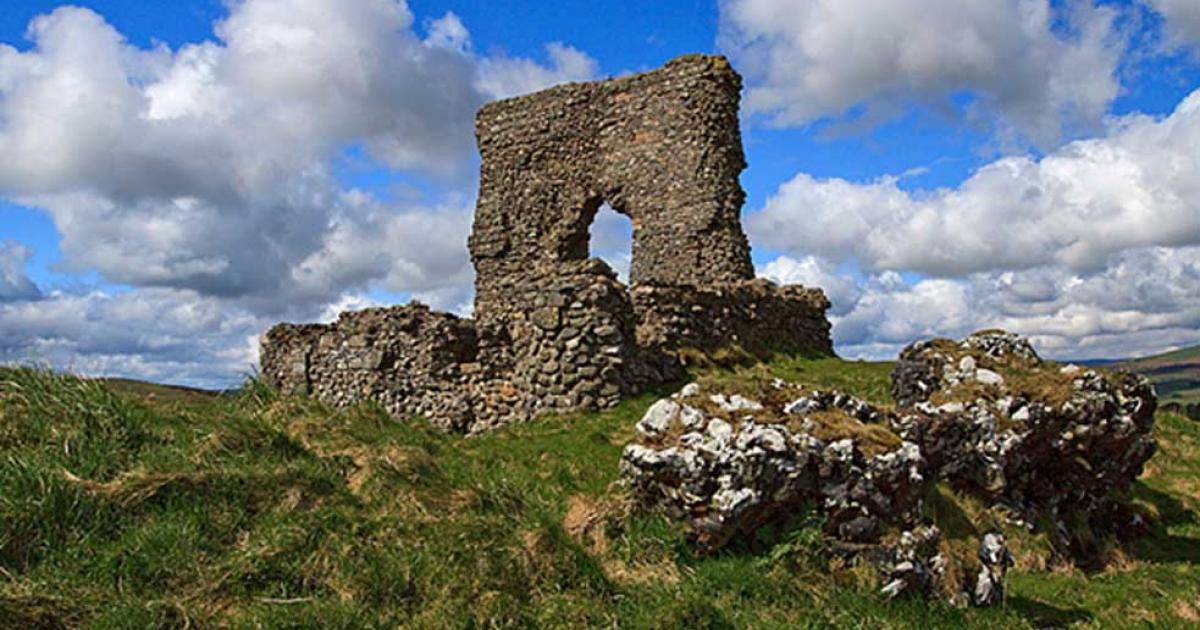 Dunnideer Castle, built on the site of a hillfort with a remaining vitrified rampart. 