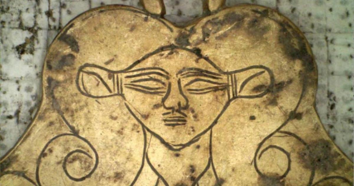 One of the tombs found by the grave of the Griffin Warrior at Pylos includes a gold pendant featuring the likeness of Hathor, an Egyptian goddess who was a protector of the dead. Source: UC Classics