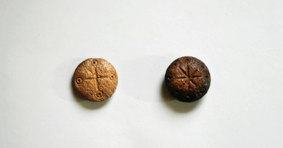 The two carved fifth century game pieces recovered during recent excavations at Hadrianopolis, Turkey.