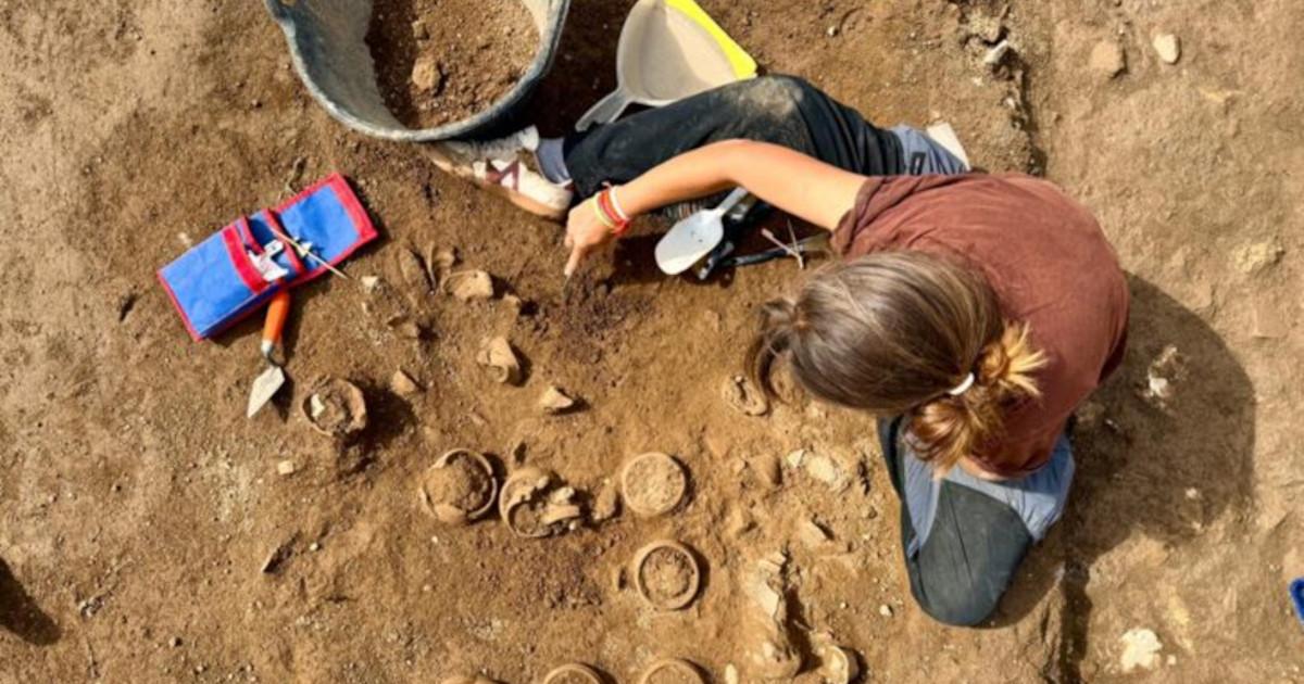 Archaeologist excavating ceramic pots at Hadrian's Villa.