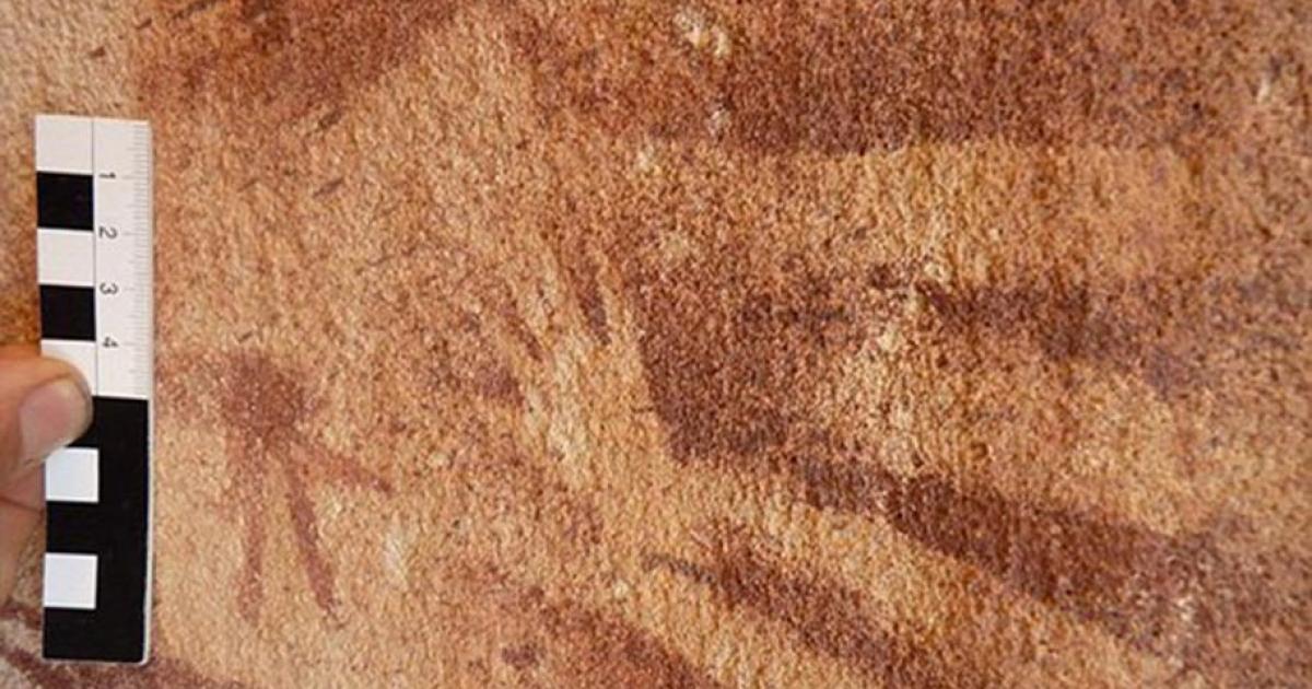 A tiny hand, originally assumed to be of a very young child or infant was stenciled inside the outline of an adult hand on the wall of the Wadi Sura II rock shelter about 8,000 years ago. New research suggests that the prints were actually made by reptiles.