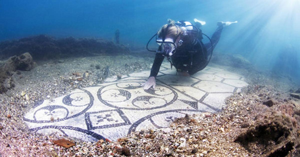 A diver explores the Baiae Underwater Archaeological Site