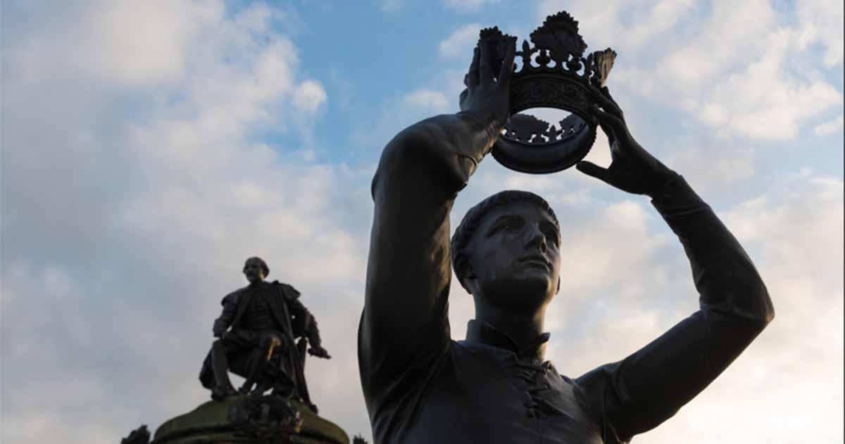 William Shakespeare and Henry V with blue sky in background in Stratford upon Avon. Source: Paul Rushton/Adobe Stock