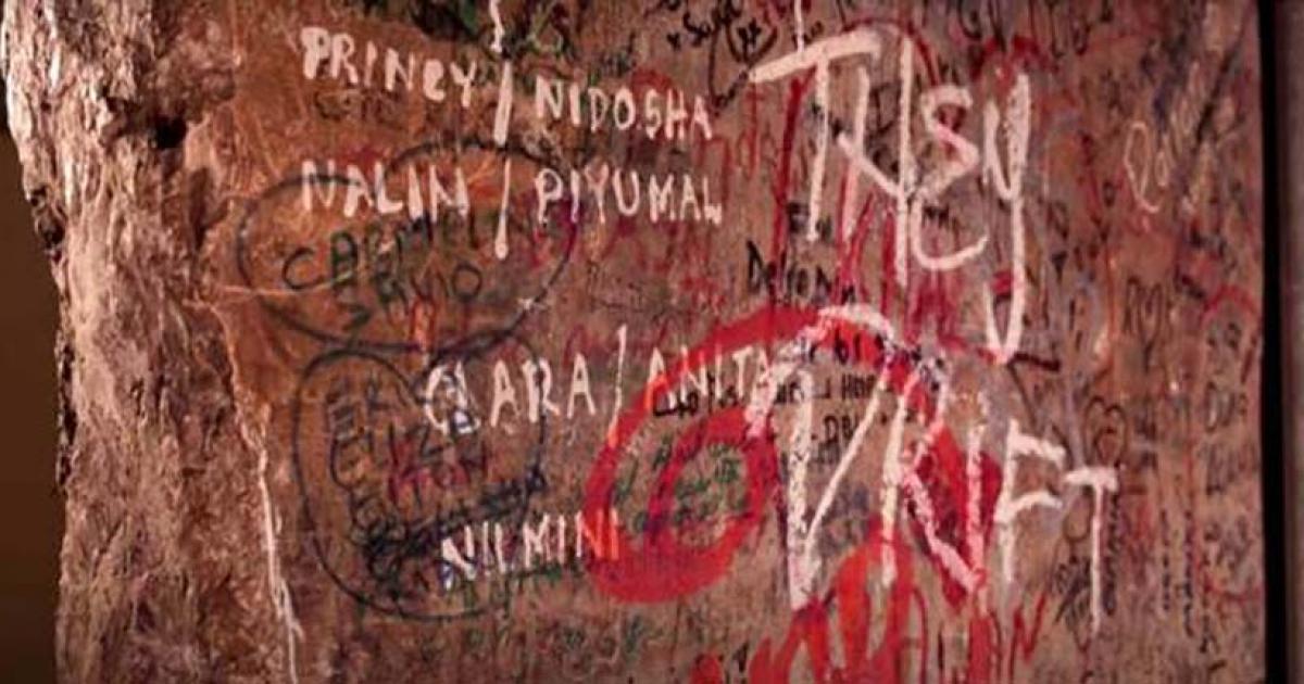 The other side of this graffiti covered slab at The Church of the Holy Sepulchre in Jerusalem led to the discovery of the beautiful medieval ancient altar.		Source: YouTube screenshot / Reuters