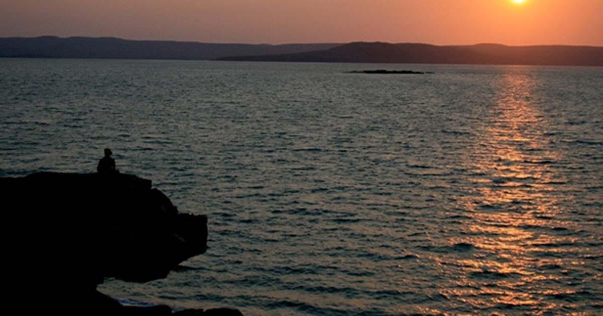 Sunset looking across Port Warrender to the Mitchell Plateau on the Kimberley coast. It is in Wunambal Gaambera country