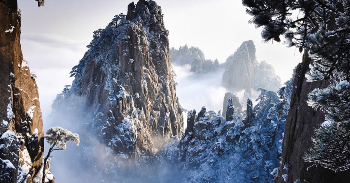 Taking Beauty to New Heights in China: What Stunning Sights Emerge on Huangshan and its Bridge of Immortals?