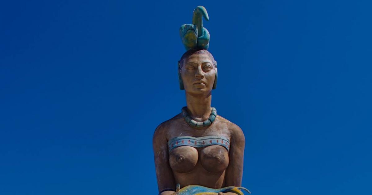 The Maya goddess Ix Chel wearing a coiled snake headdress