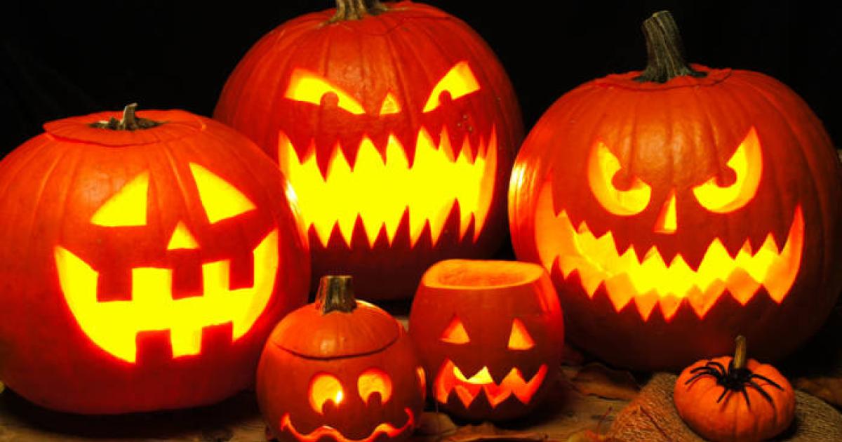 Spooky illuminated pumpkin Jack o Lanterns.  