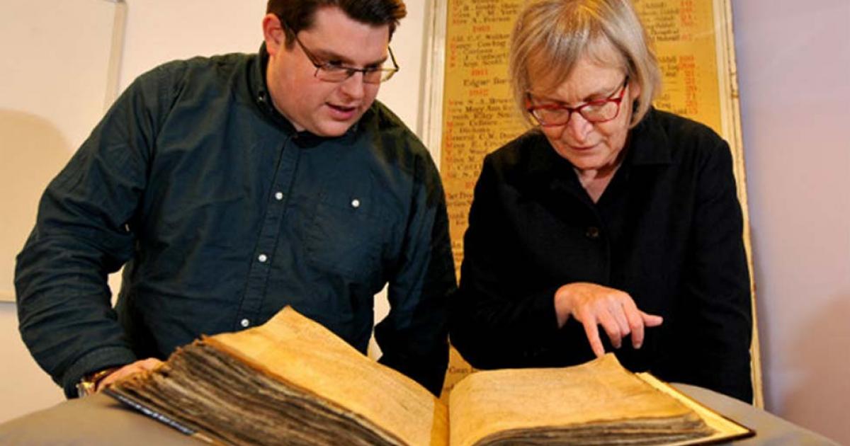 Gary Brannan and Sarah Rees Jones examine the note regarding Joan of Leeds in one of the archbishops’ registers. 