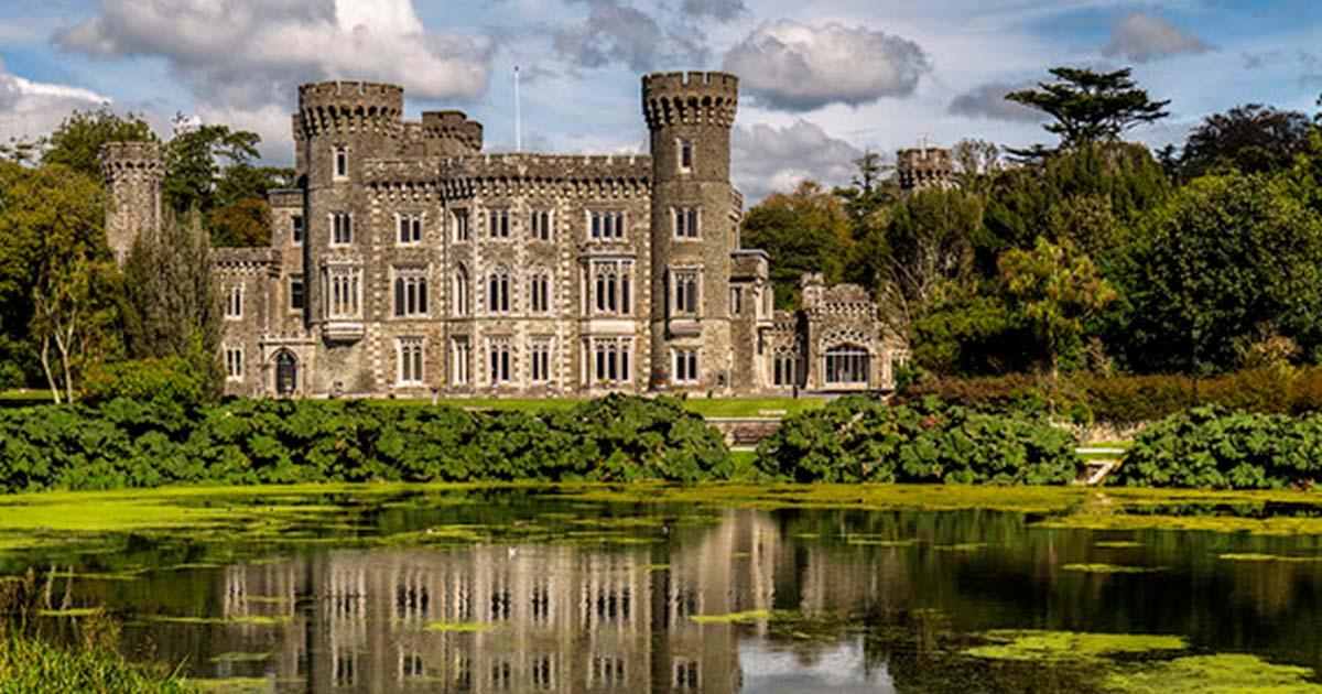  Johnstown Castle, Murrintown, with refection in its lake, Wexford, Ireland. Source: Mike Searle/CC BY-SA 2.0