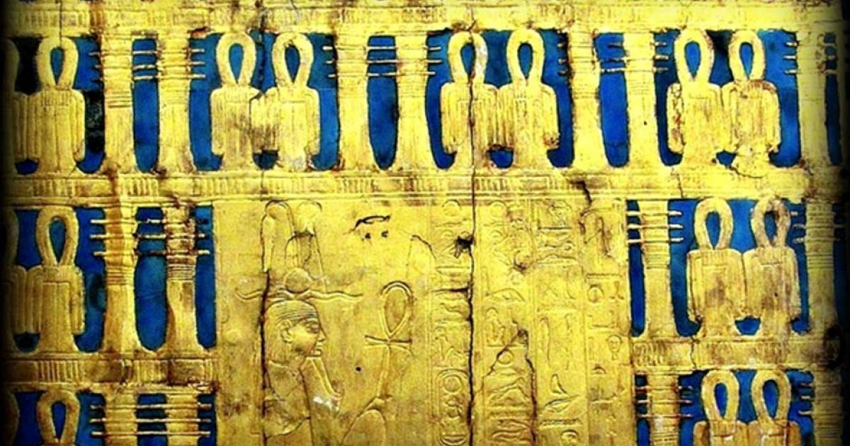 Detail from the outermost shrine of Tutankhamun showing a seated deity; design by Anand Balaji