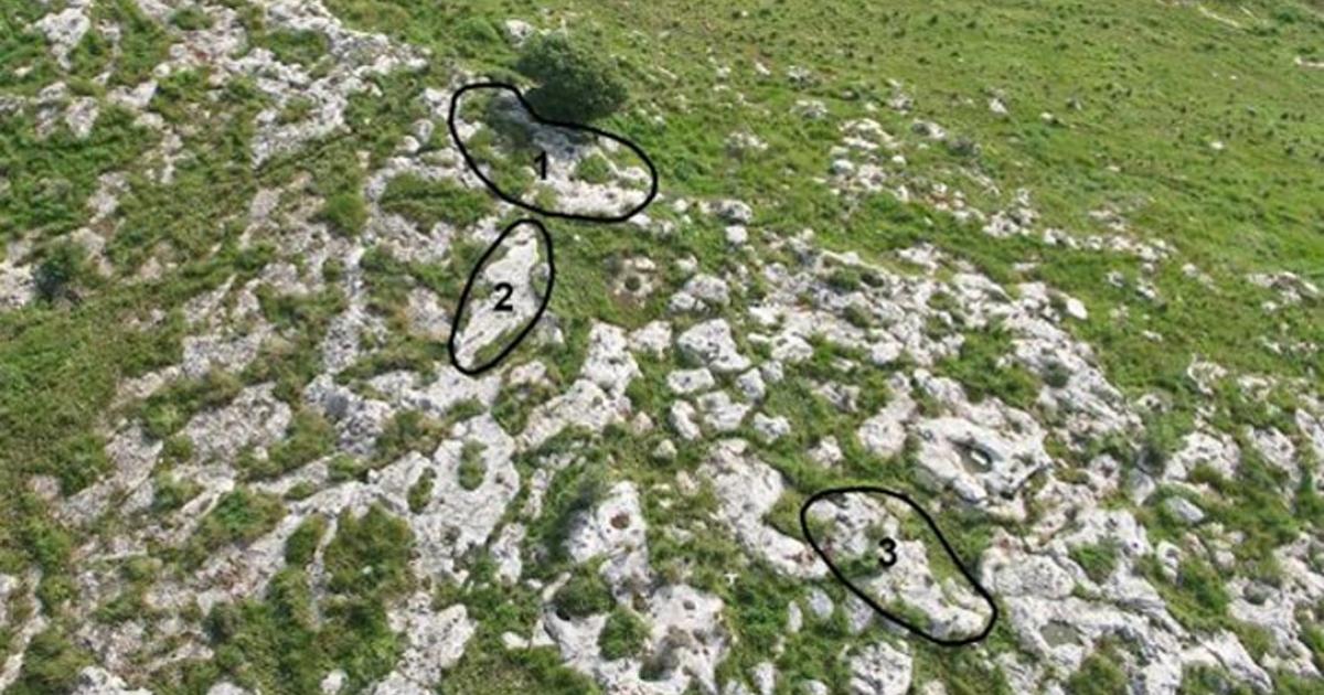 Aerial view of Kaizer Hilltop with three sampled rock surfaces marked in black circles