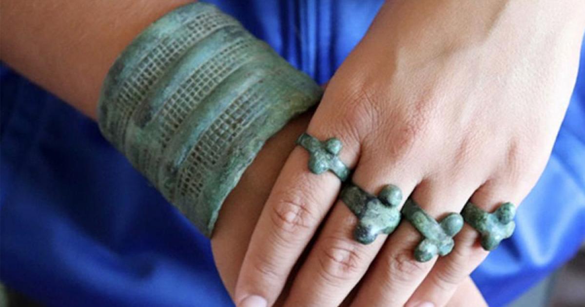 The elite woman found in a grave in southern Siberia belonged to the Karasuk culture, which was known for its impressive skills in producing high-quality bronze which they cast in wax molds. The jewelry recently found in the grave is shown here on a living woman’s hand. 	Source: Novosibirsk Institute of Archeology and Ethnography