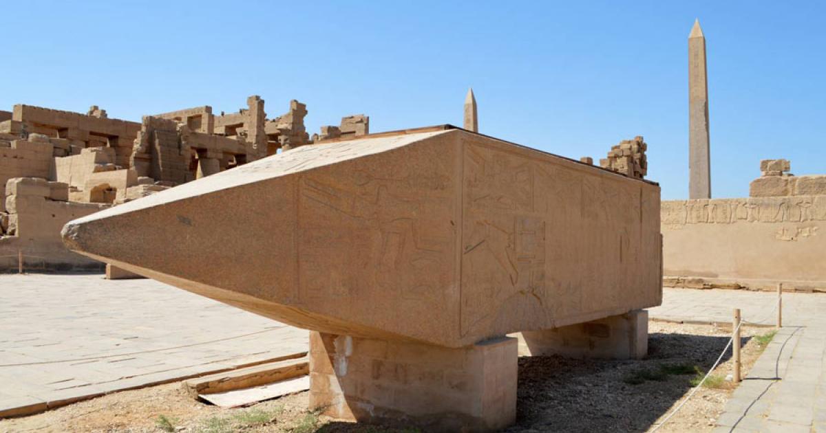 The upper third of the original Karnak obelisk, one of several obelisks dedicated to Queen Hatshepsut of 14th-century BC Egypt, which was recently re-erected in Luxor near the Karnak Temple where it was toppled by an ancient earthquake or intentionally destroyed. Source: The National News
