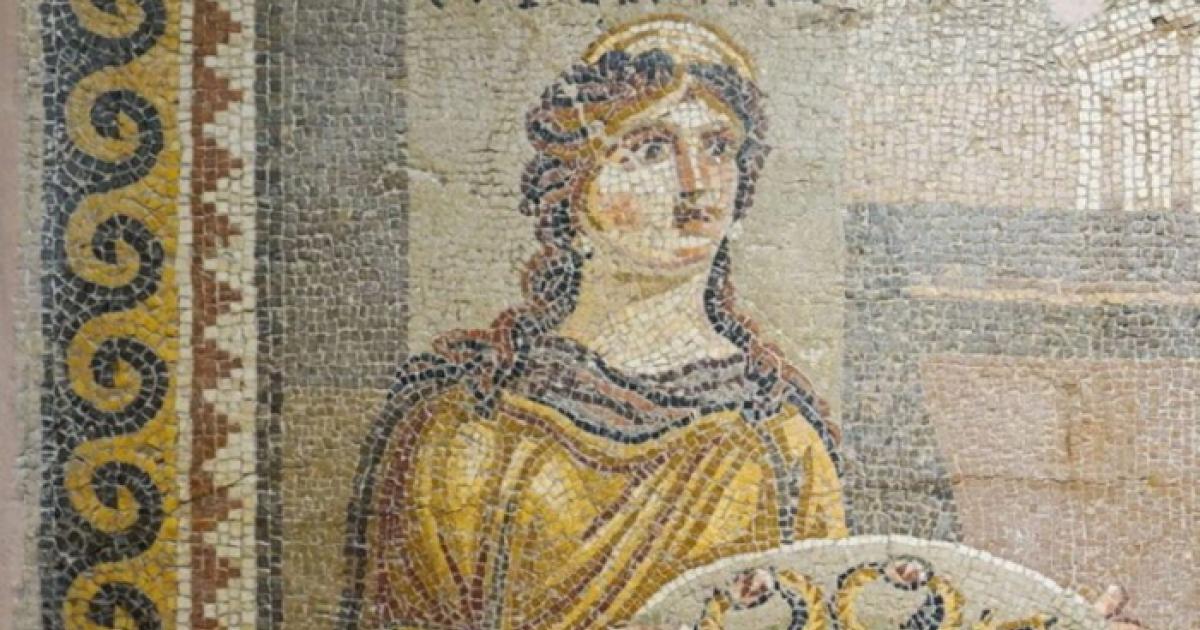 Detail of the Khresis mosaic, depicting a woman carrying a tray of jewelry from the Trojan War cycle.  