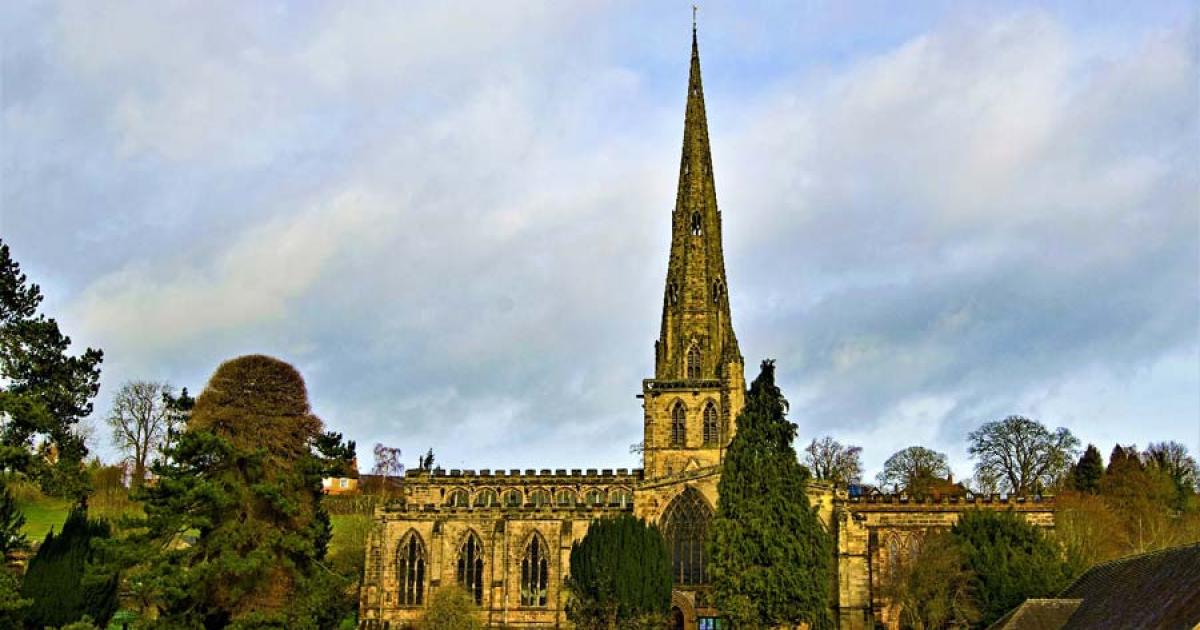 Saint Oswald's Church, Ashbourne, Derbyshire, England, dedicated to King Oswald of Northumbria, who became a saint. 		Source: Peter / Adobe Stock
