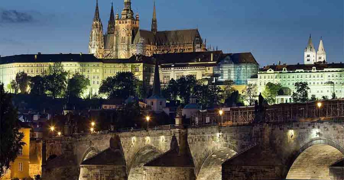 Night view of the castle and Charles Bridge, Prague, Czech Republic. Prague, over time, became the definitive center of the growing Kingdom of Bohemia.	