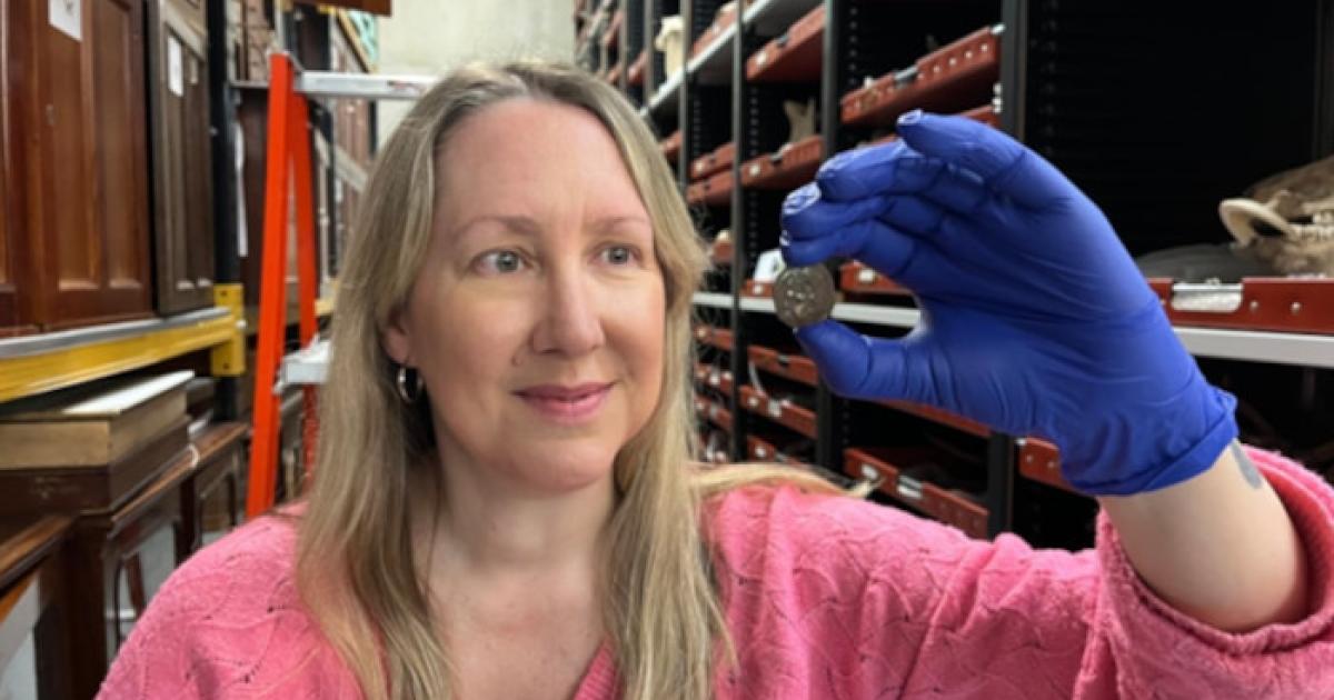 Kat Baxter, Leeds Museum and Galleries’ curator of archaeology and numismatics, shows the ancient coin.