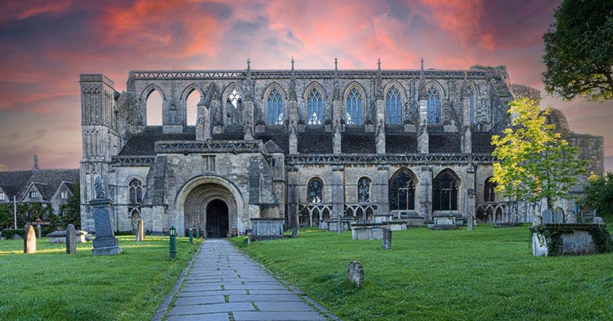 An arson attempt at Malmesbury Abbey was stopped by heroic locals. Source: Lukas Gojda / Adobe Stock