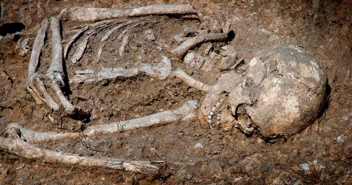 Human skeleton in a grave (representational image). Source: Idanthyrs / Adobe Stock.