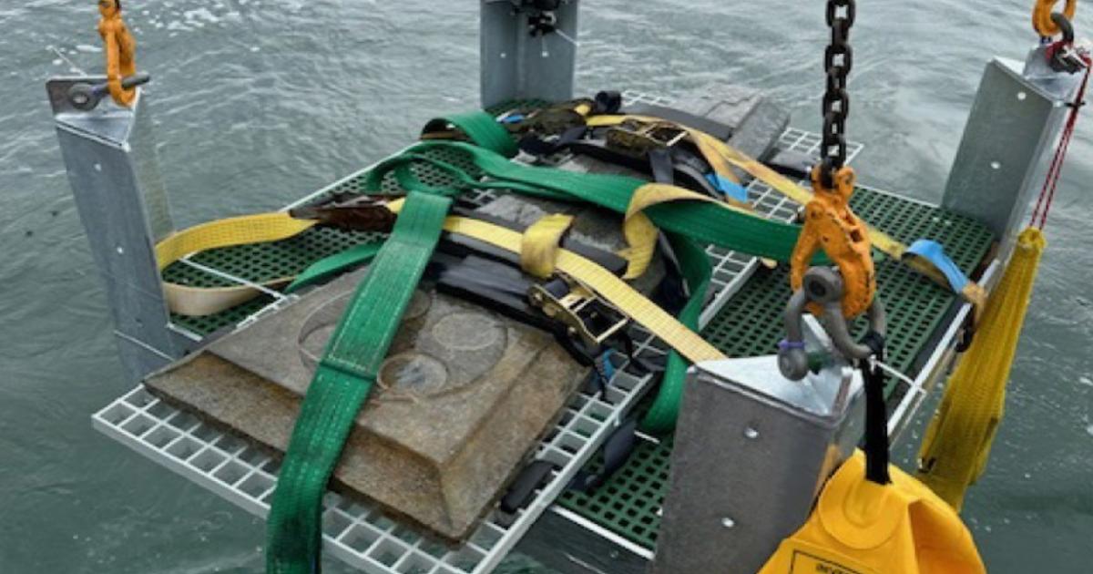 The grave slabs being recovered from the Dorset shipwreck