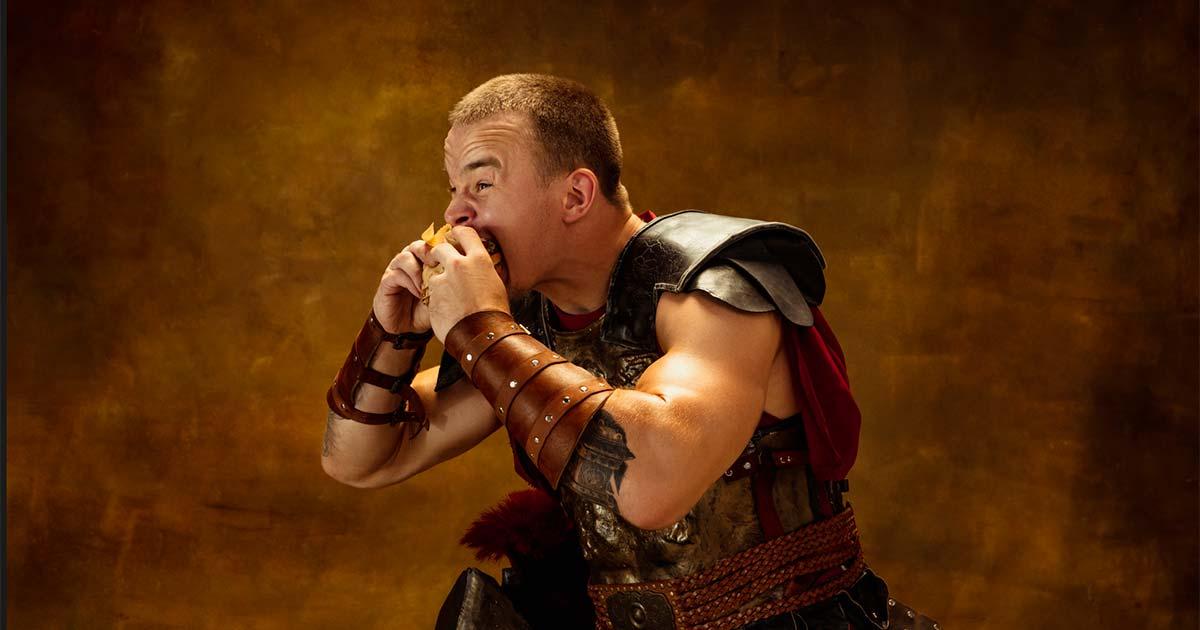 Medieval soldier eating. Source: master1305 / Adobe Stock.