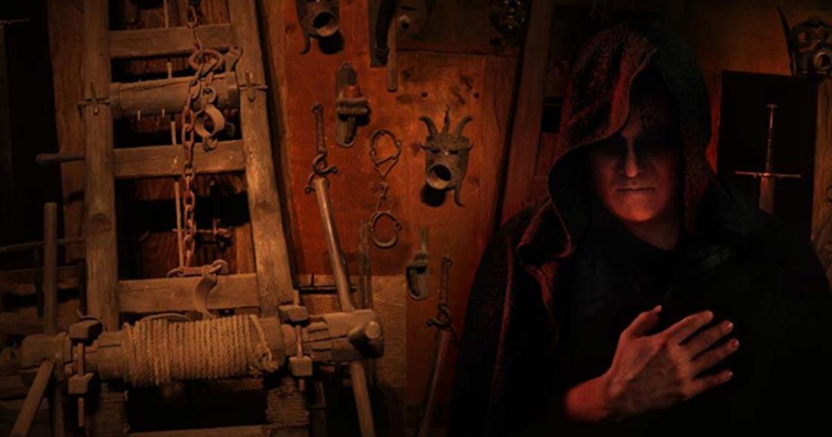: A hooded Inquisitor in a Medieval torture chamber. Source: diter /Adobe Stock