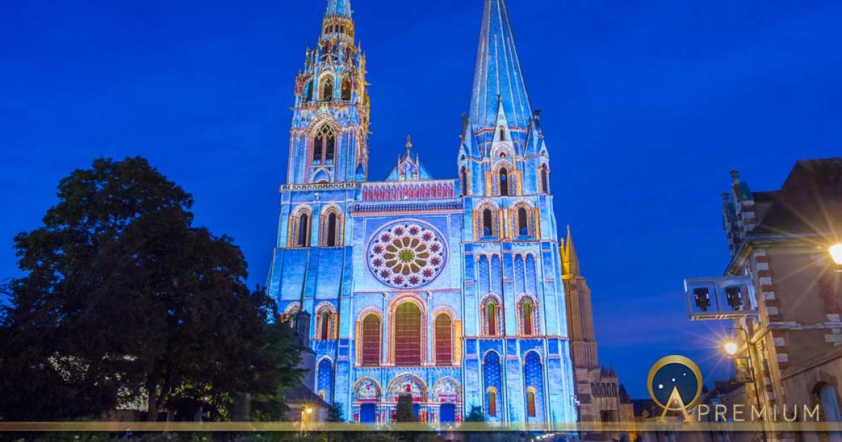 The illuminated Our Lady of Chartres cathedral, France (kovalenkovpetr / Adobe Stock)