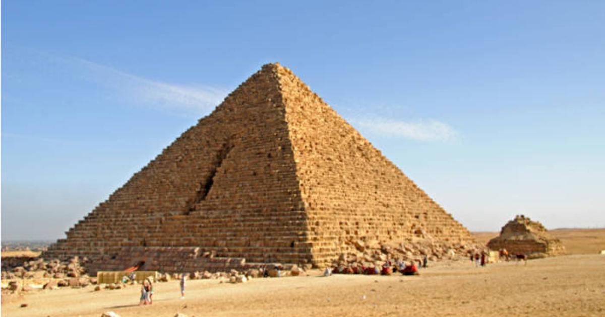 The Menkaure Pyramid at Giza with its distinctive granite casing stones visible at the base