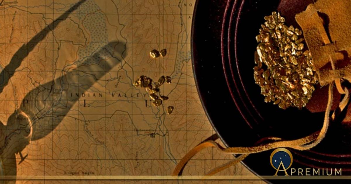 Old gold rush vignette with oil Lamp shadow, leather pouch, gold nuggets, gold pan and old topographic map (John Nakata / Adobe Stock)
