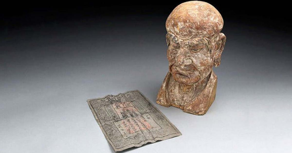 Rare Ming Dynasty Banknote Found Hidden Inside a Chinese Sculpture 