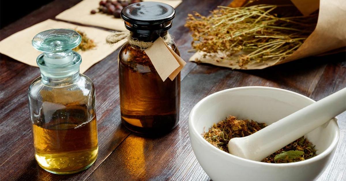 Apothecary vintage set of bottles, herbs and mortar Source: Kiryl Lis/ Adobe Stock