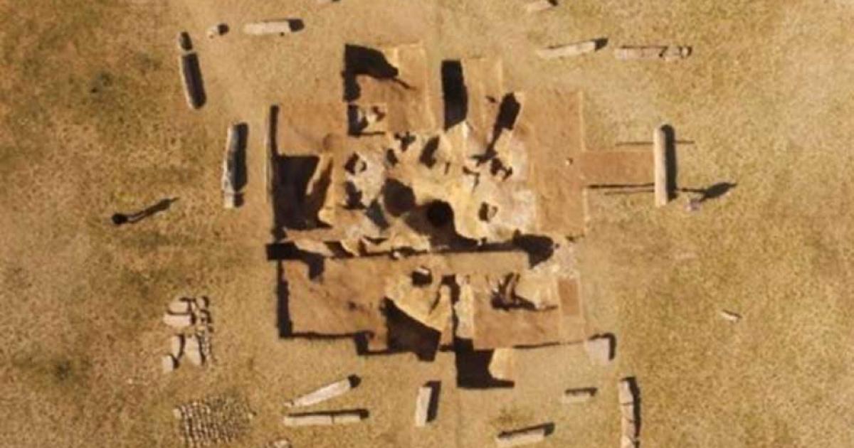 Drone aerial shot of the ancient Turkish ruins on Dongoin shiree. (North at the top.) Segments of the inscriptions and sarcophagus excavated from the hole at the center of the ruins can be seen.