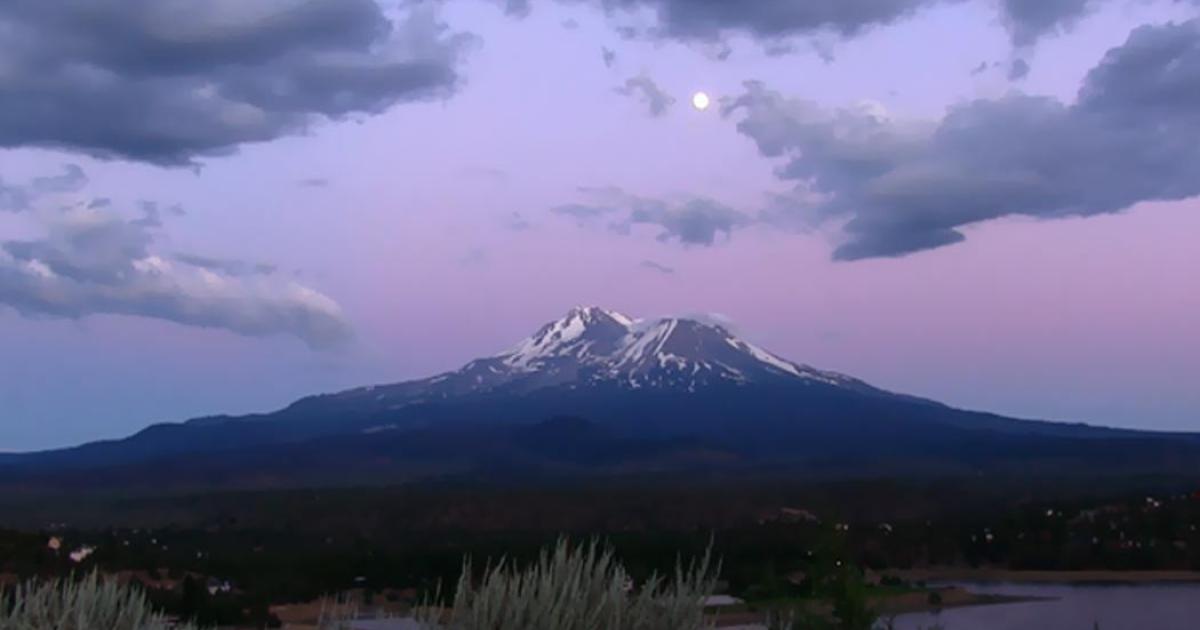 “Full moon rising over Mount Shasta, as seen from northern valley.” 