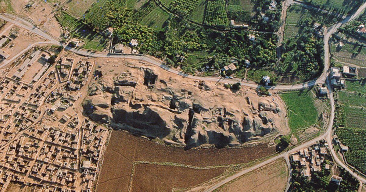 Aerial photo of the ancient Neolithic city of Jericho, adjacent to modern farms.