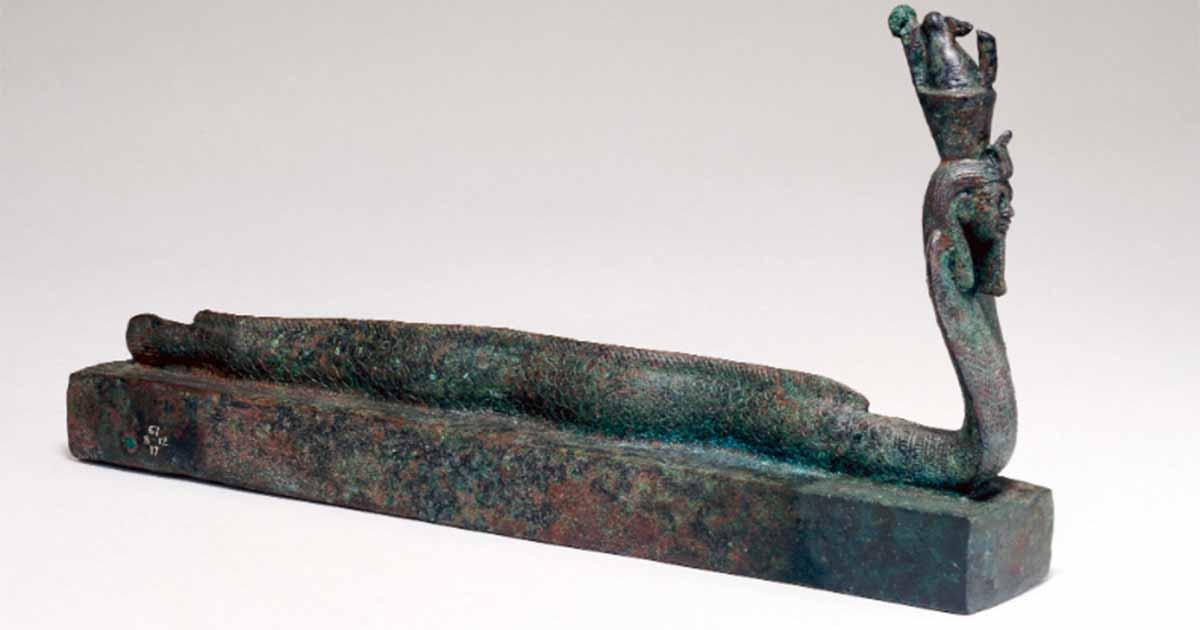 Animal coffin EA36151, surmounted by a human-headed part-eel, part-cobra creature wearing a double crown, associated with the ancient Egyptian god Atum. Source: The Trustees of the British Museum/Nature