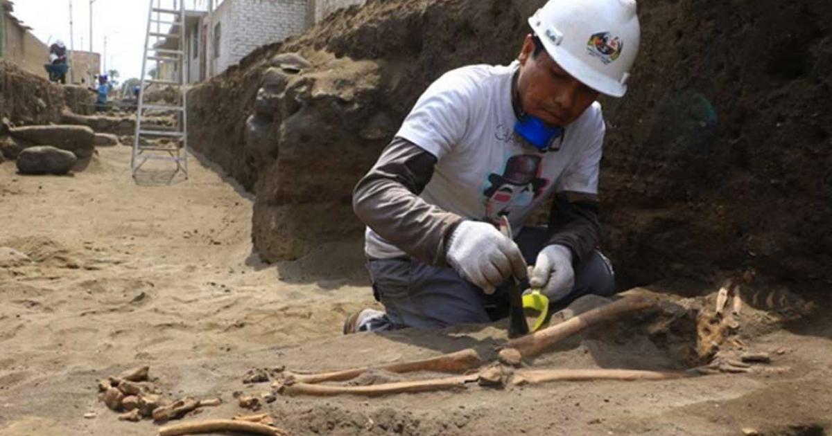 Excavating one of the Pre-Inca tombs.