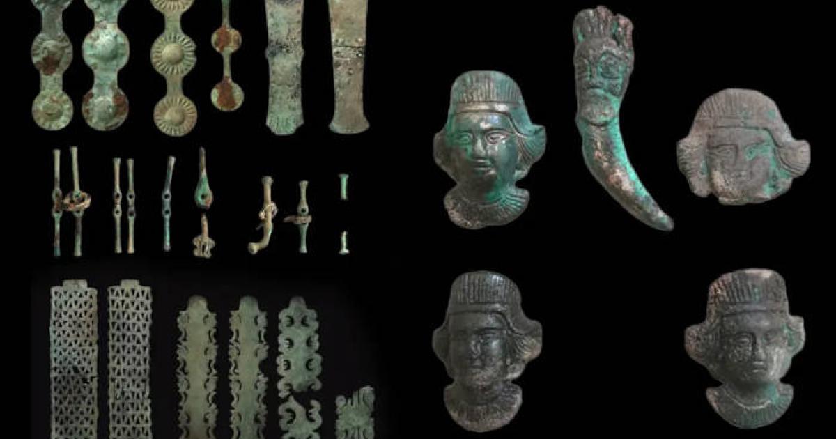 Bronze ritual artifacts including horse gear and ornamental plaques from the 4th-century BC sacrificial complex discovered at Vysokaya Mogila-Studenikin Mar, Orenburg Region.  
