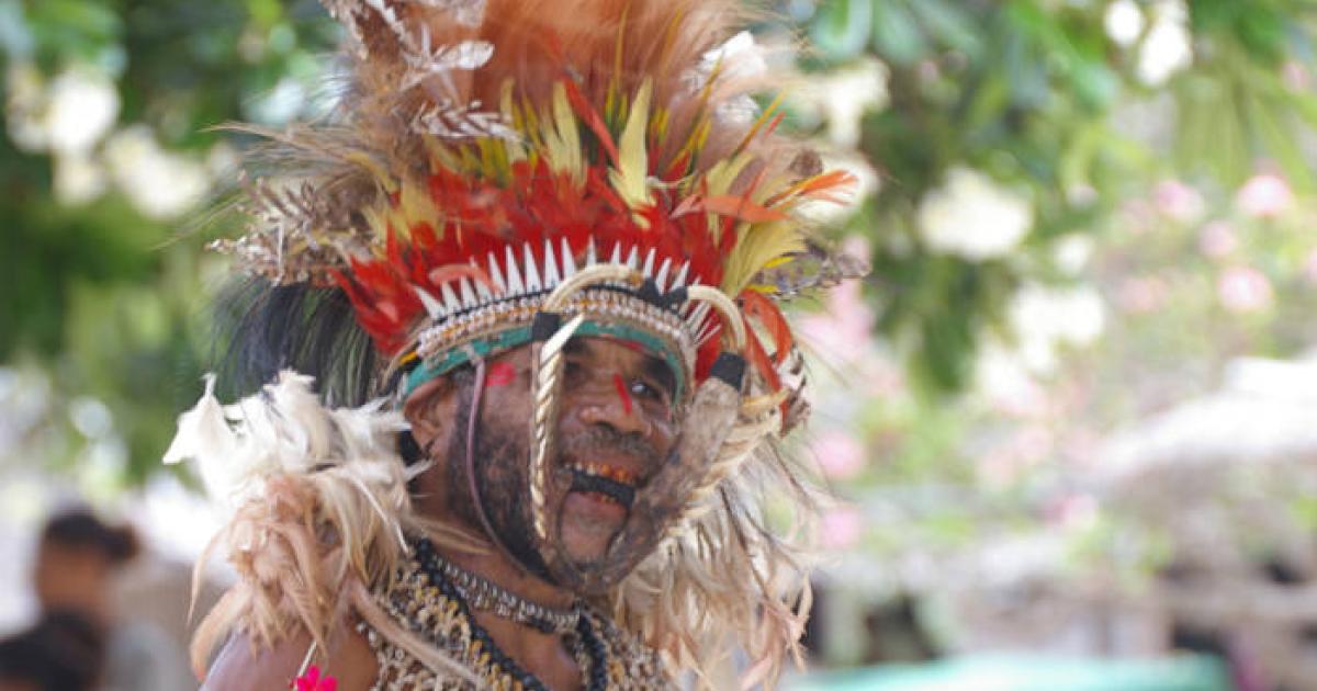 A Papua New Guinean wearing traditional wear.
